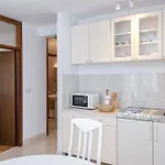 Mi